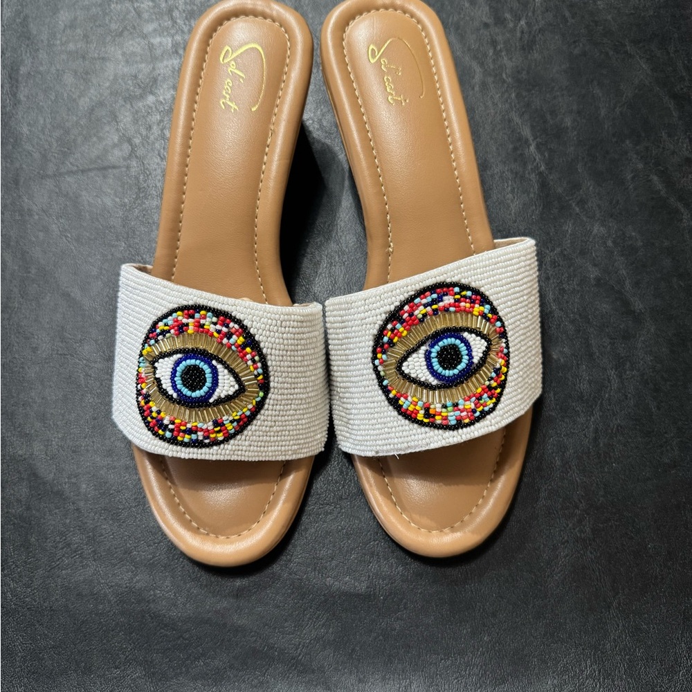 Sol’ Cart Beige Beaded Eye Slide Sandals